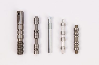 CNC turned steel shafts and pins for automotive assemblies