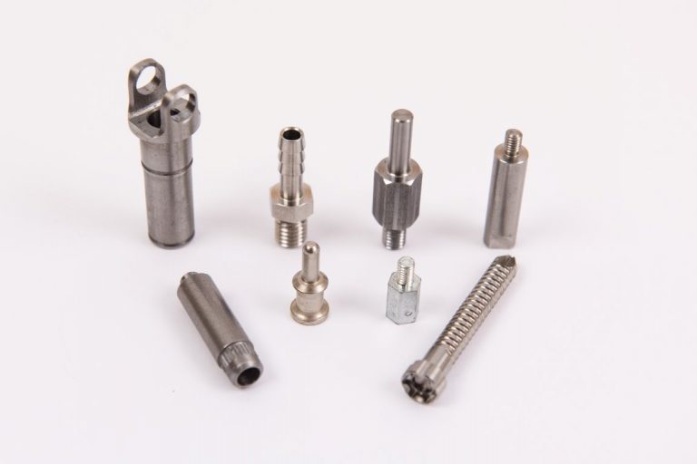 Precision CNC turned steel parts: pins, bushings, connectors and threaded components