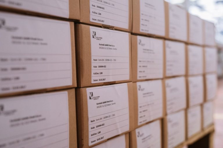 Labelled boxes of finished machined components ready for shipment across the EU